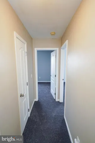 a view of a room with a wardrobe space