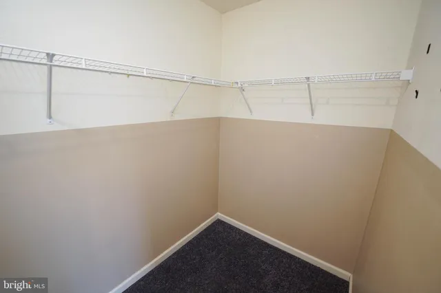 a view of a room with racks on the wall