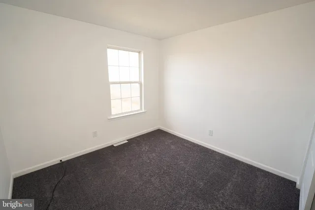an empty room with an entrance