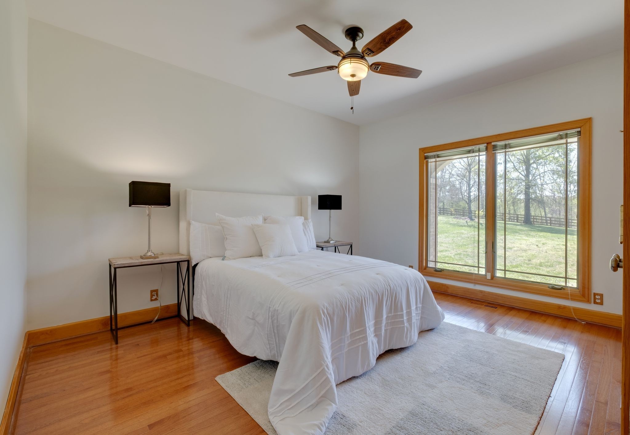 1249 White Road Bon Aqua, TN 37025 - Photo 26 of 60 a bedroom with a large bed and a window