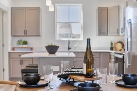 a kitchen with a sink and a stove