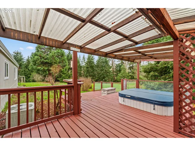 a view of balcony with wooden floor