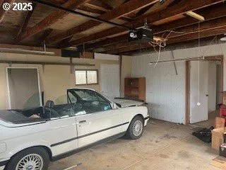 a room with gym equipment and a window