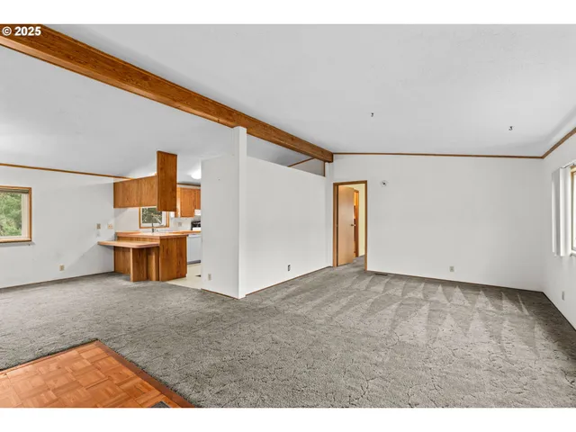 a view of a livingroom with furniture