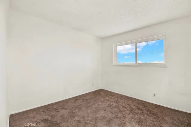a room with air conditioner and a window