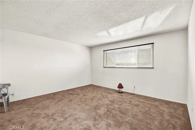 a bathroom with a shower and a toilet