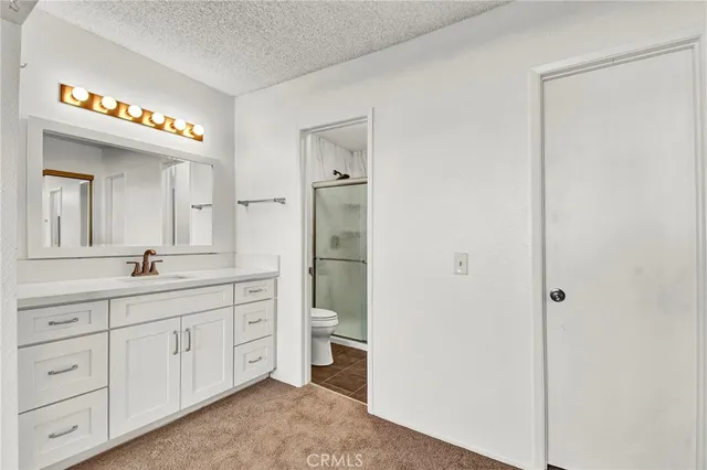 a view of a swimming pool with a deck