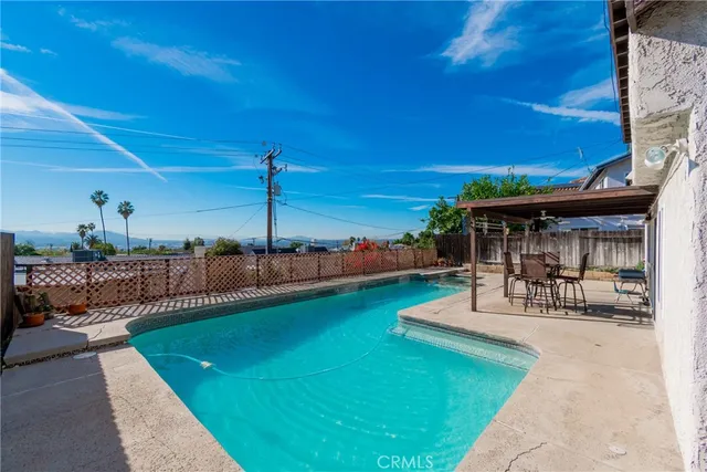 a view of a backyard with a patio