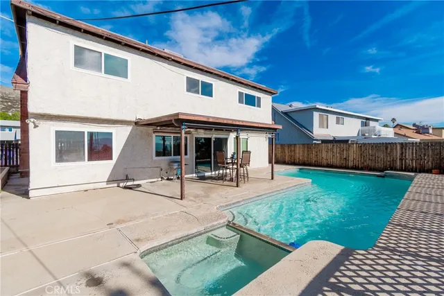 an aerial view of residential houses and city view