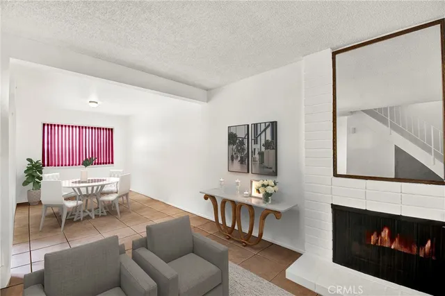 a kitchen with stainless steel appliances granite countertop wooden cabinets a stove top oven a sink and dishwasher