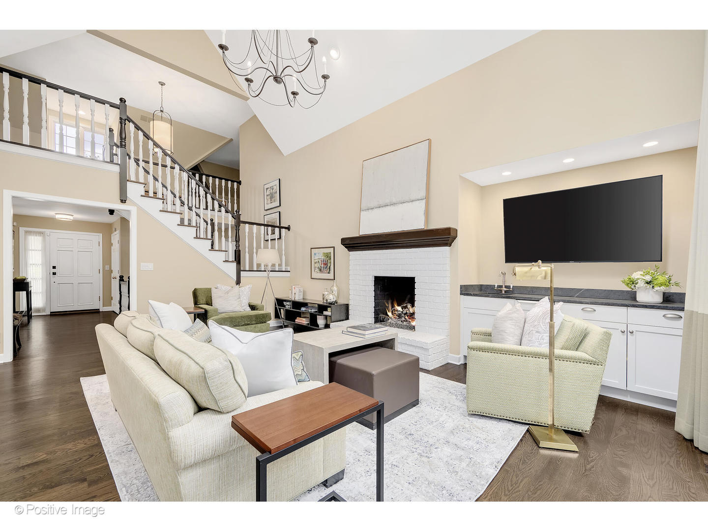 13 Tartan Ridge Road Burr Ridge, IL 60527 - Photo 13 of 37 a living room with furniture a flat screen tv and a fireplace