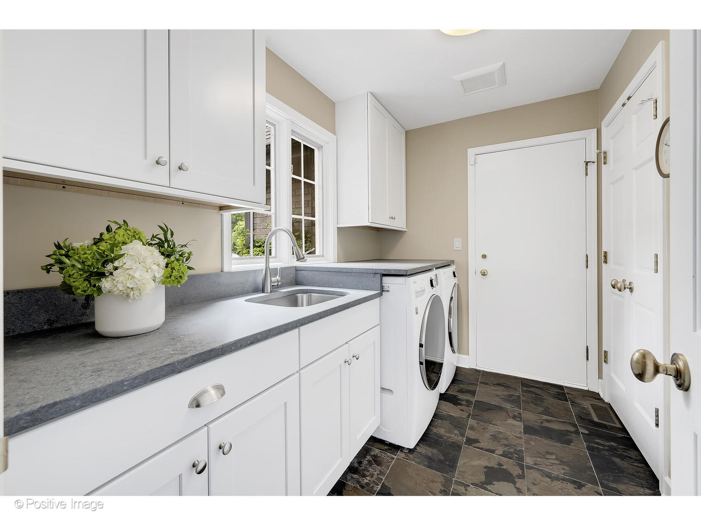 13 Tartan Ridge Road Burr Ridge, IL 60527 - Photo 23 of 37 a kitchen with a sink and cabinets