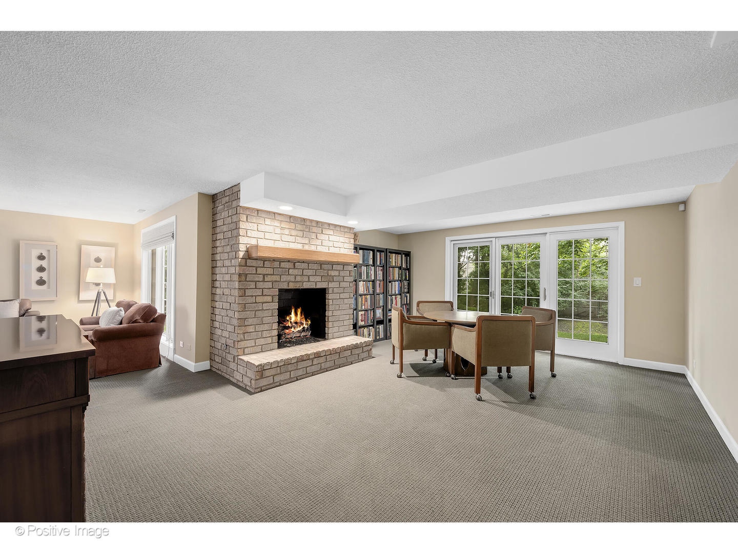 13 Tartan Ridge Road Burr Ridge, IL 60527 - Photo 29 of 37 a living room with furniture and a fireplace