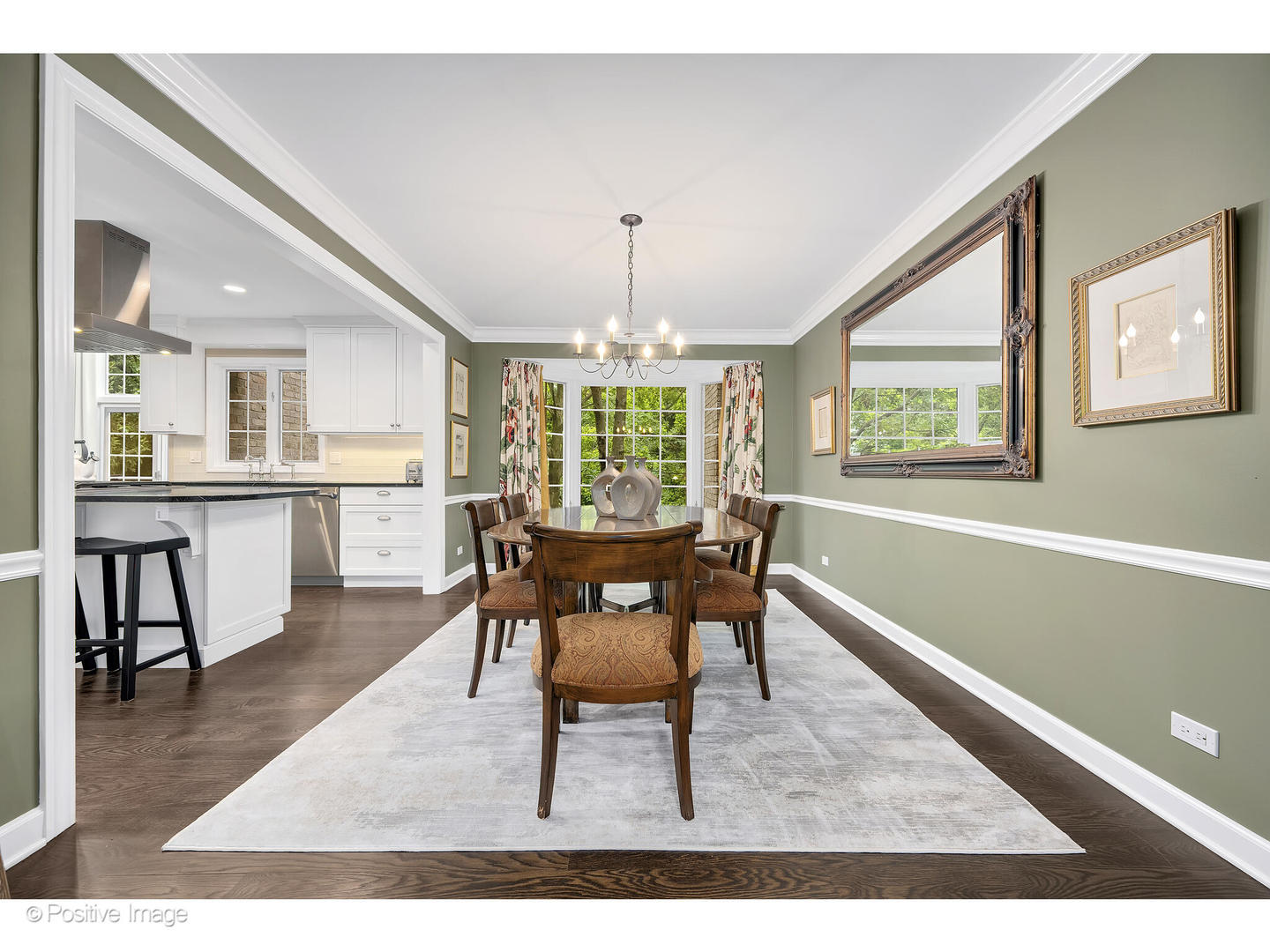 13 Tartan Ridge Road Burr Ridge, IL 60527 - Photo 6 of 37 a dining room with furniture a chandelier and wooden floor