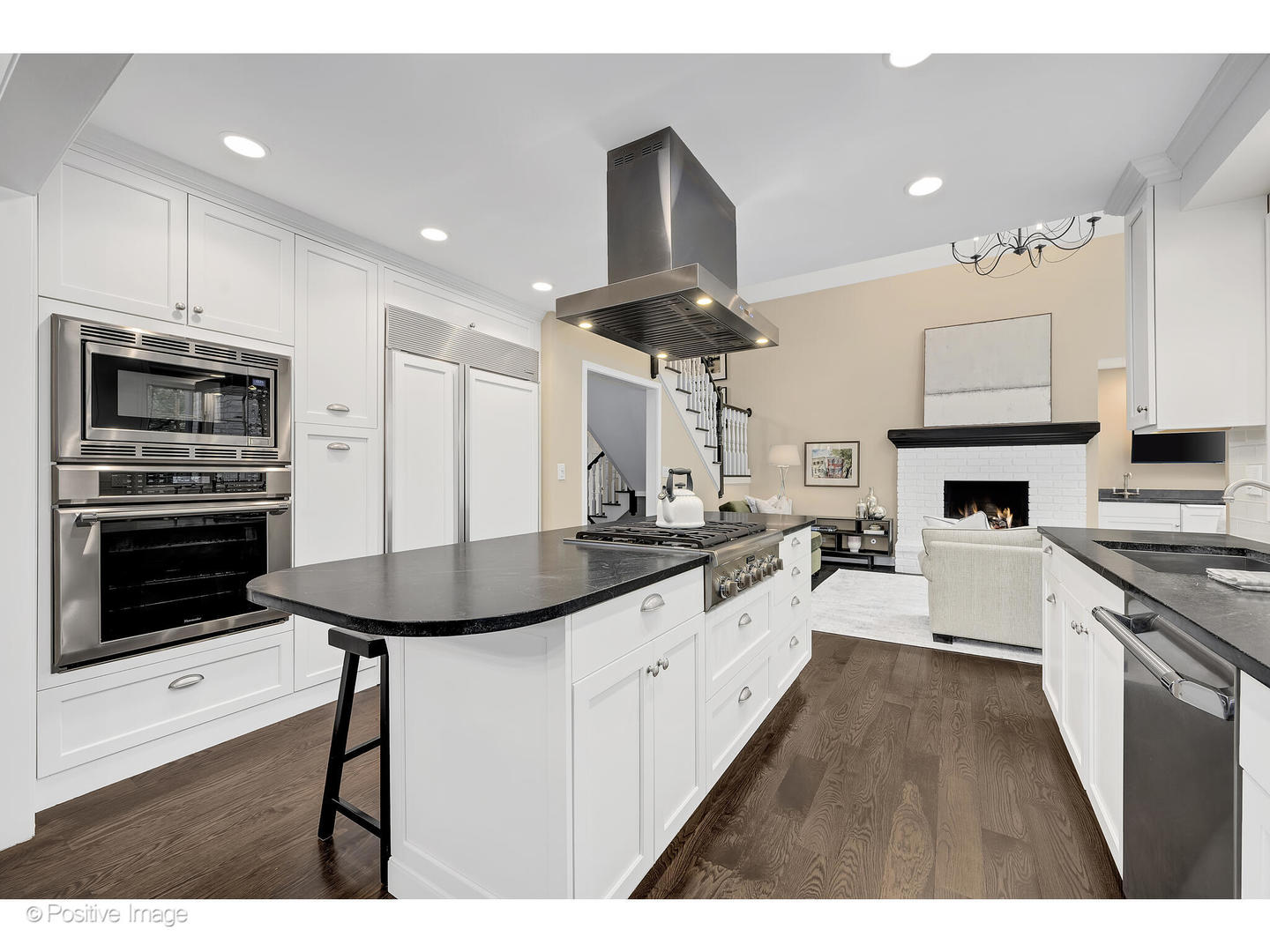 13 Tartan Ridge Road Burr Ridge, IL 60527 - Photo 10 of 37 a kitchen with stainless steel appliances granite countertop a stove a sink and a microwave
