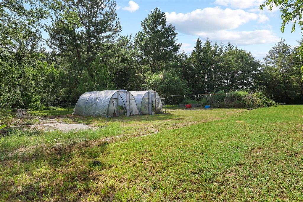 252 Meadow Lake Estates Road Denison, TX 75021 - Photo 14 of 37 Storm Shelter located conveniently on property