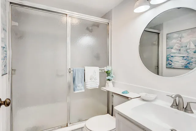 a view of a house with backyard and porch