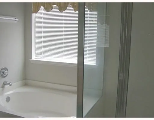 a bathroom with a sink and a bathtub