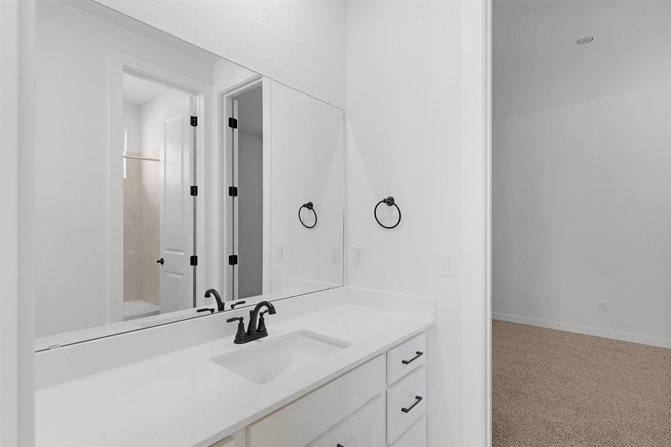 328 Ridgewell Loop Georgetown, TX 78633 - Photo 6 of 28 Bathroom featuring vanity, shower / bath combination, and light carpet
