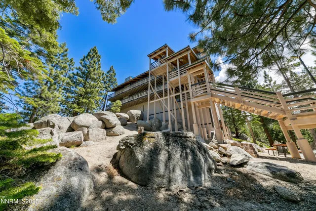 a view of a swimming pool with a lounge chairs