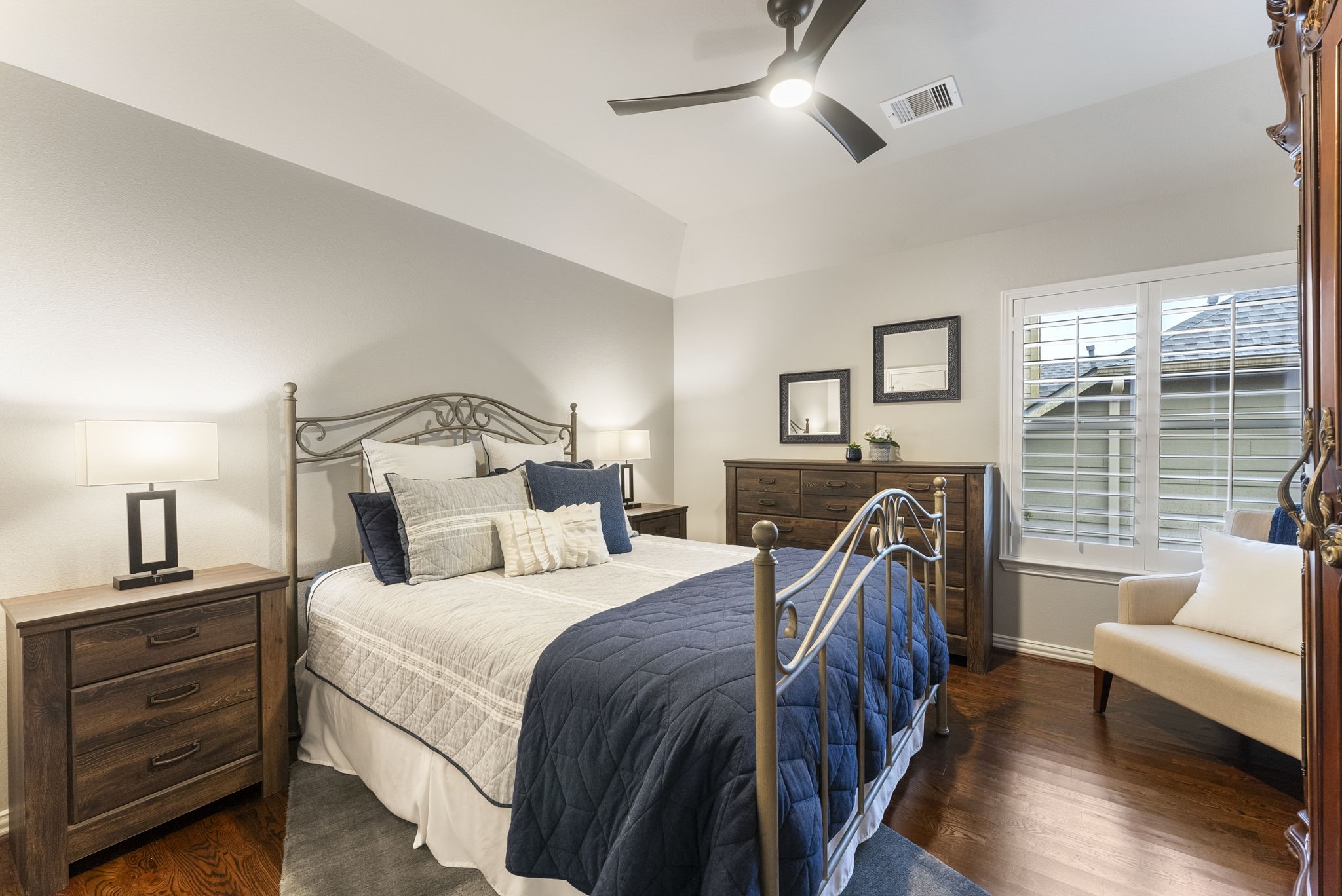 27614 Colin Springs Lane Spring, TX 77386 - Photo 31 of 47 Upstairs bedroom with wood flooring, elevated ceiling with updated fan, and spacious closet.