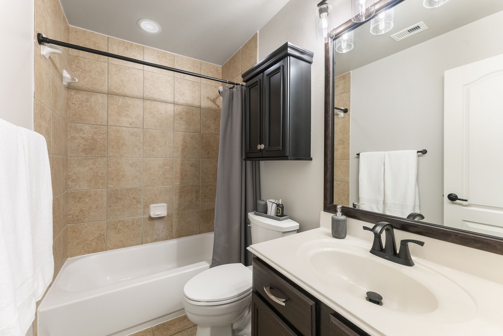 27614 Colin Springs Lane Spring, TX 77386 - Photo 32 of 47 Second full bath upstairs with with tub/shower combo, extra upper storage, and updated toilet and plumbing & lighting fixtures!