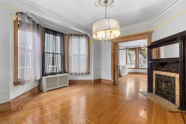 a kitchen with granite countertop a sink and steel appliances
