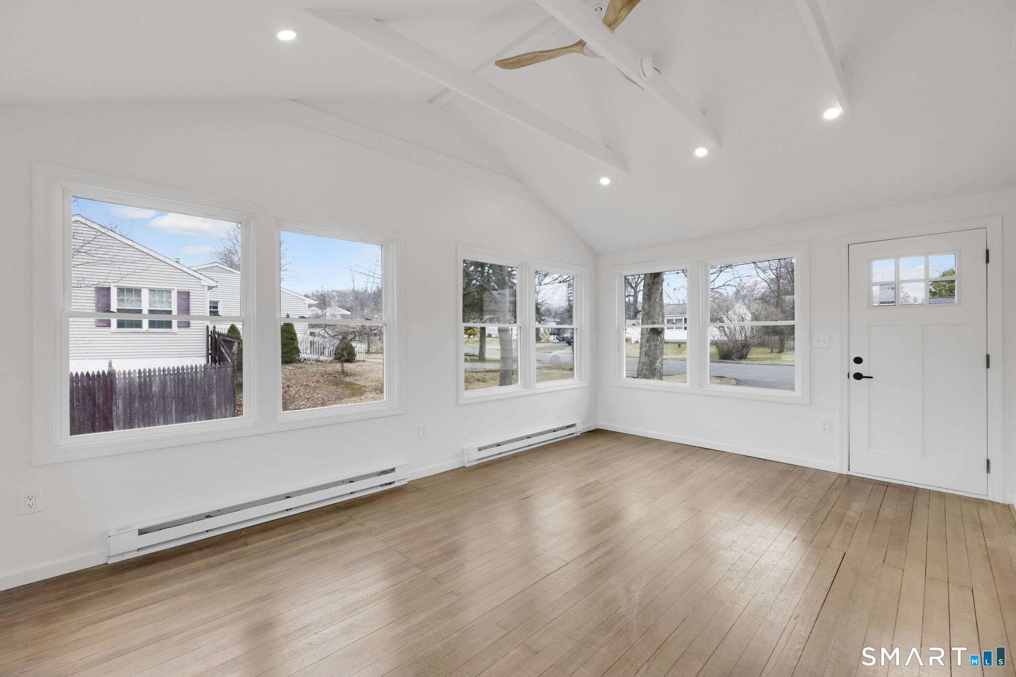 99 Hickory Lane Wolcott, CT 06716 - Photo 9 of 27 Fully enclosed sunroom/heated