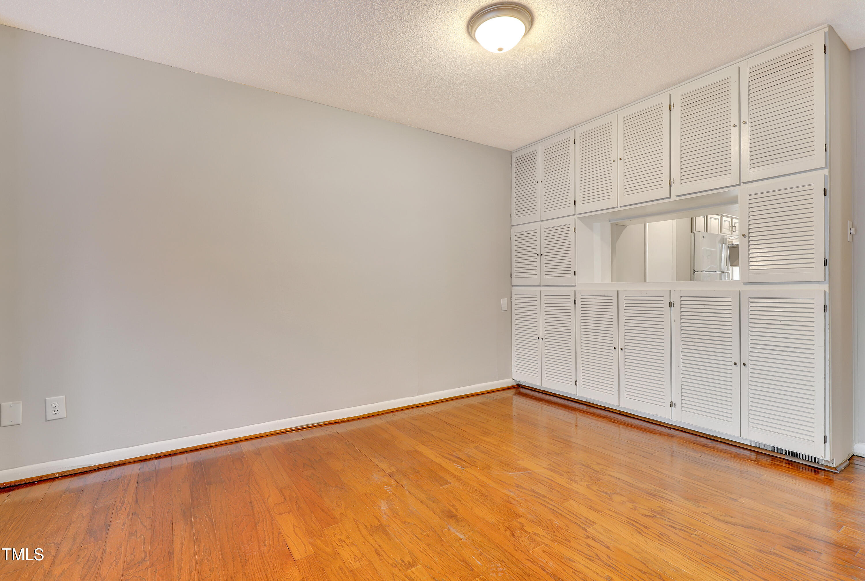 196 Ridge Trail Chapel Hill, NC 27516 - Photo 7 of 32 an empty room with cabinet