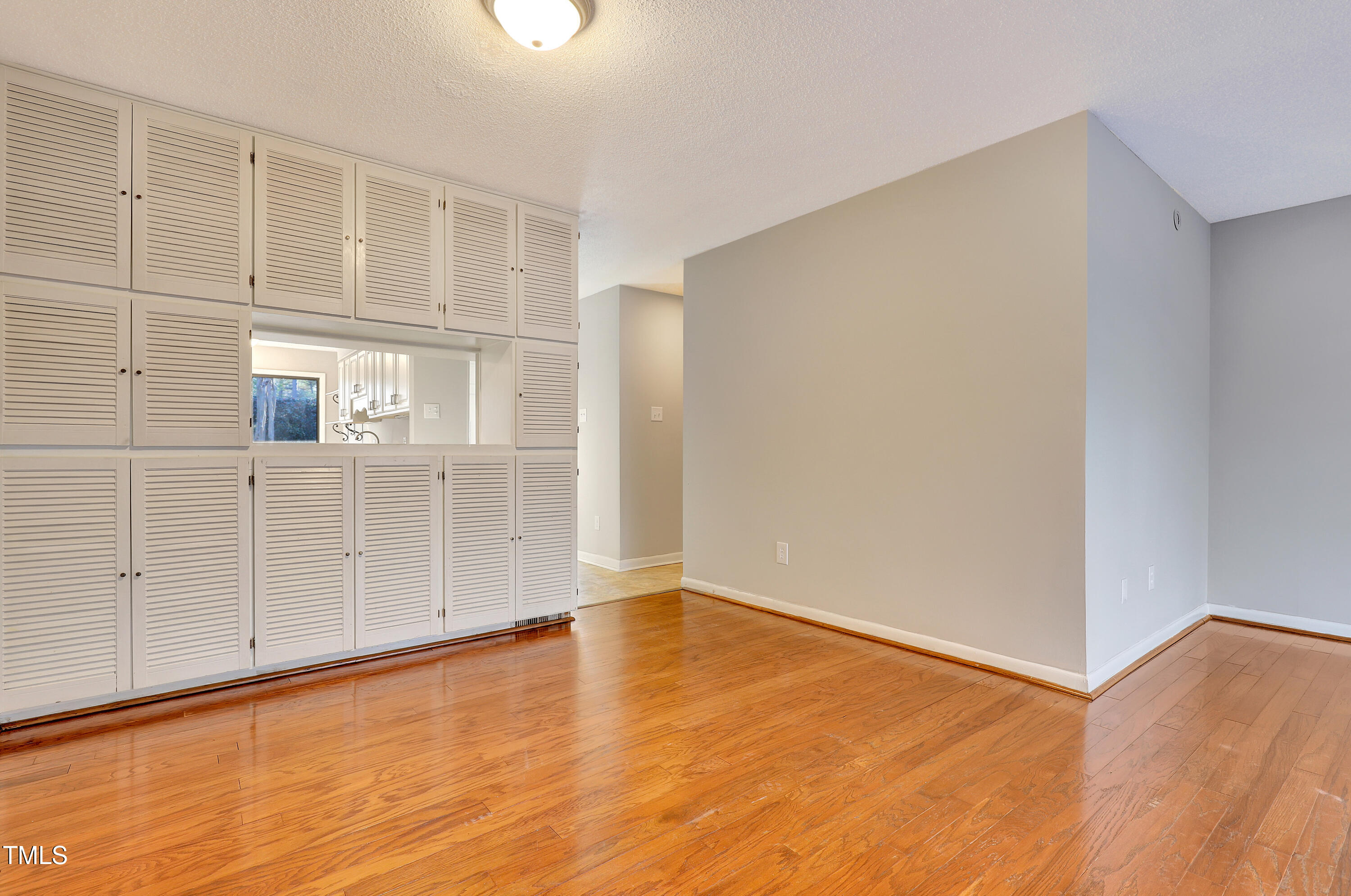 196 Ridge Trail Chapel Hill, NC 27516 - Photo 8 of 32 an empty room with cabinet