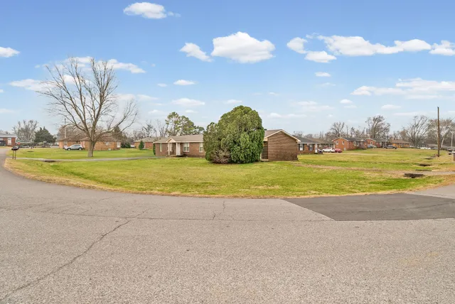 a view of a lake with a house