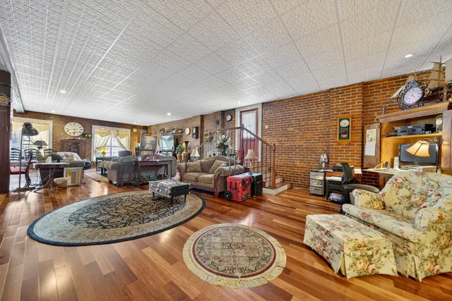 a kitchen with a refrigerator and a stove