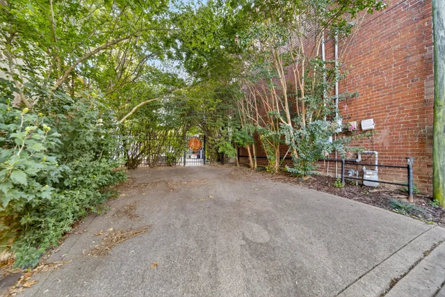 a kitchen with stainless steel appliances granite countertop a stove and refrigerator