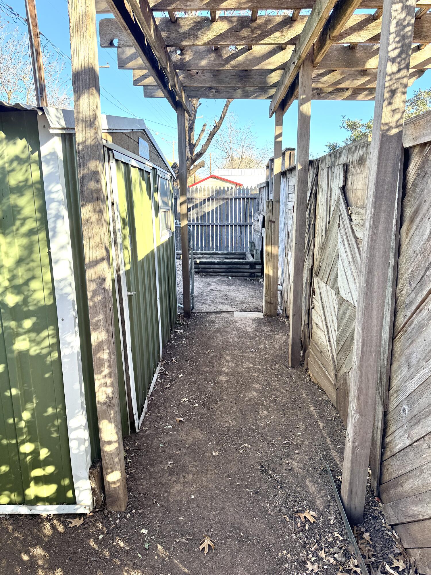 4932 63rd Street Lubbock, TX 79414 - Photo 14 of 14 a view of a pathway of a house
