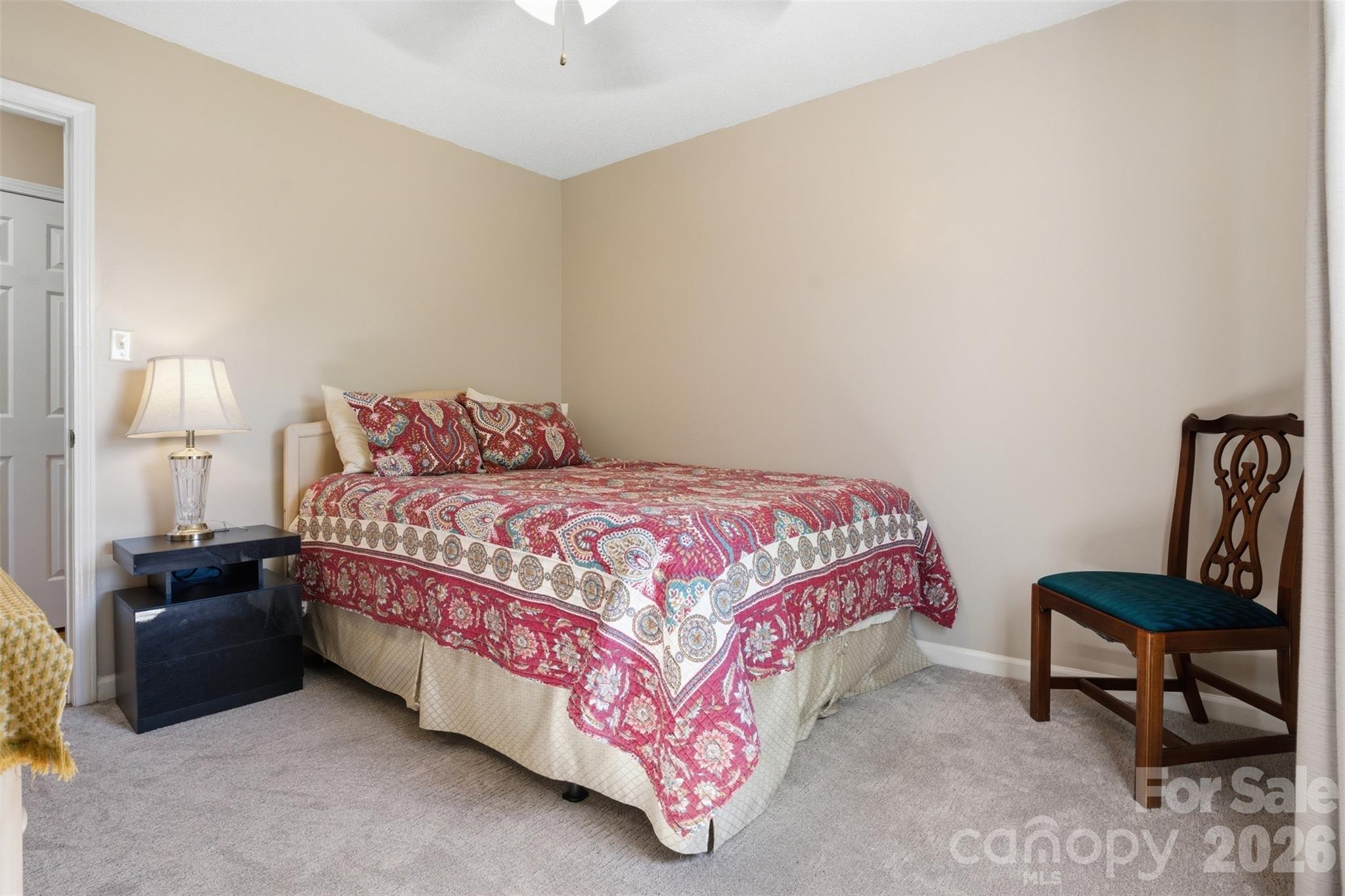 3918 Plum Street Conover, NC 28613 - Photo 14 of 31 a bedroom with a bed and a couch