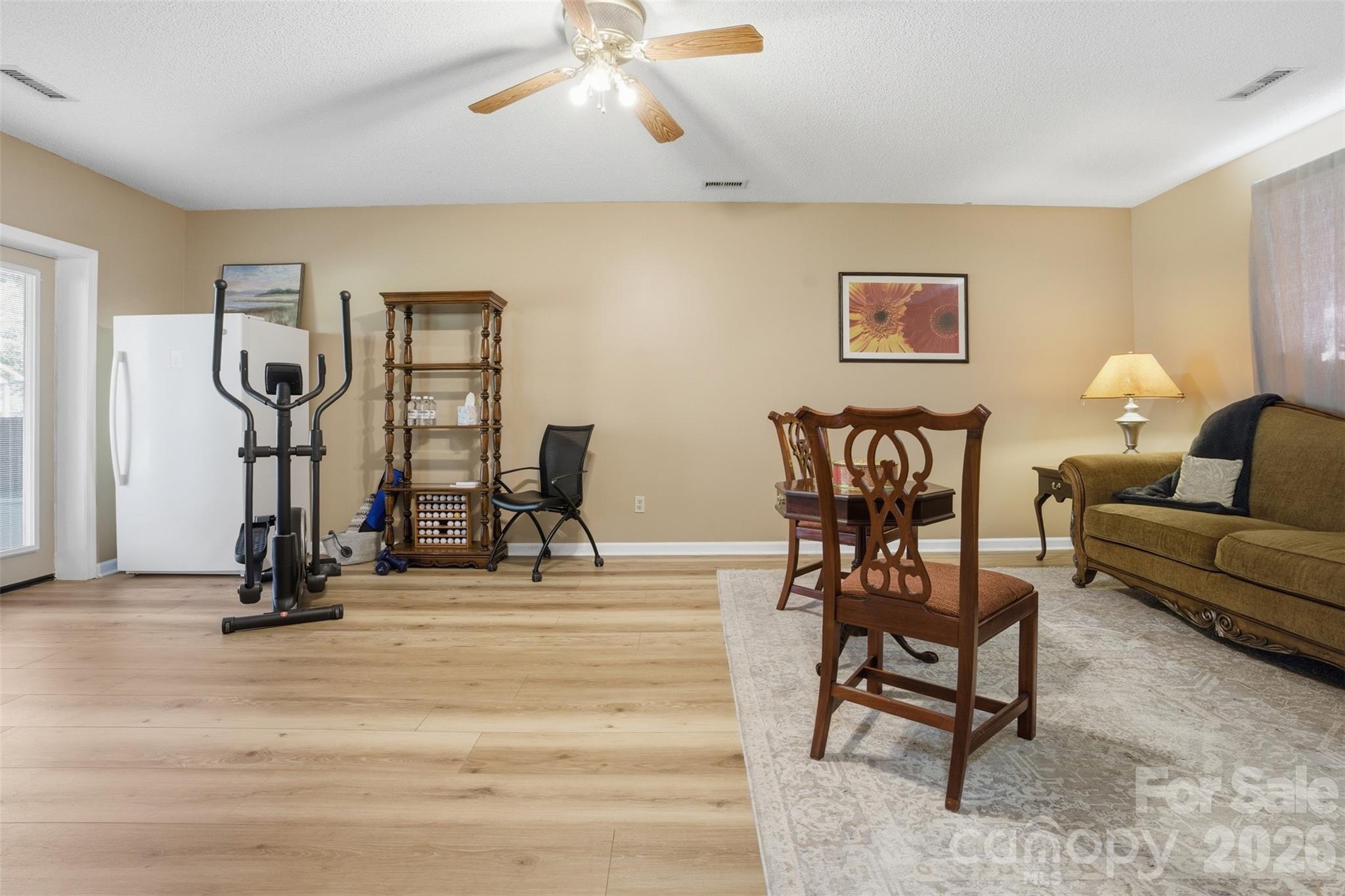 3918 Plum Street Conover, NC 28613 - Photo 19 of 31 a view of a livingroom with furniture and a gym equipment