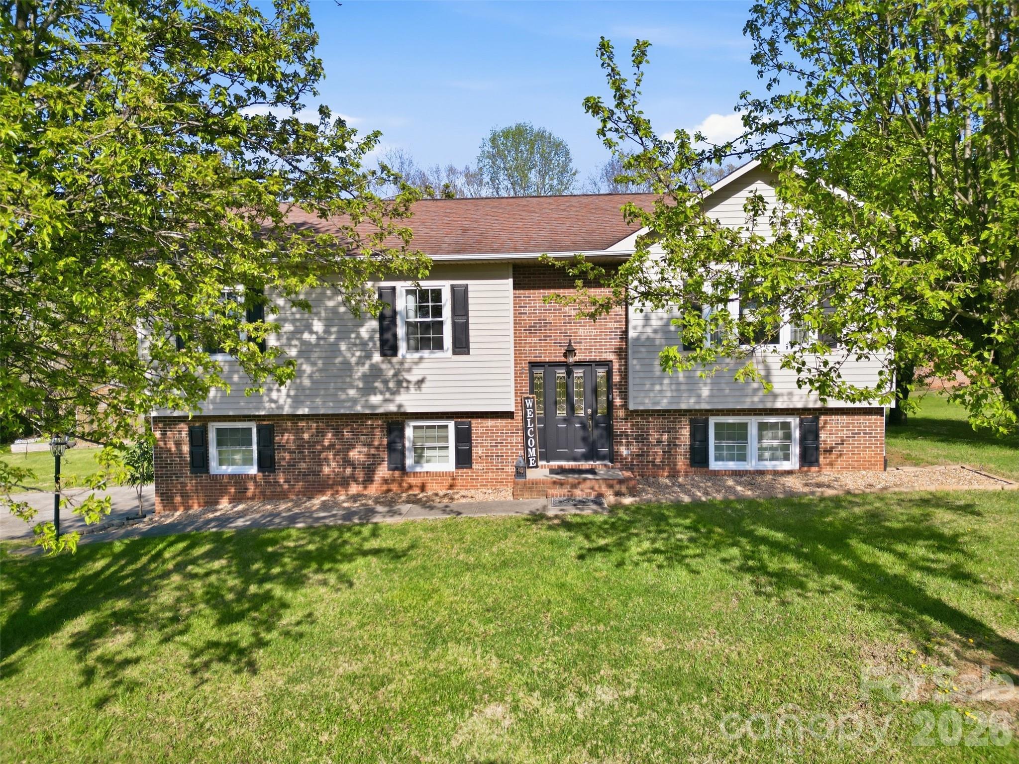 3918 Plum Street Conover, NC 28613 - Photo 2 of 31 front view of a house with a big yard