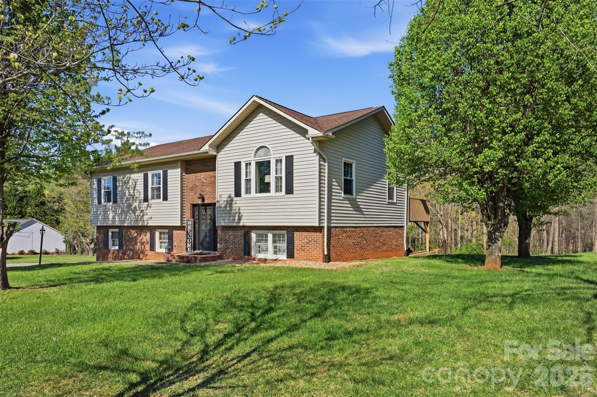 3918 Plum Street Conover, NC 28613 - Photo 26 of 31 a front view of house with yard and green space