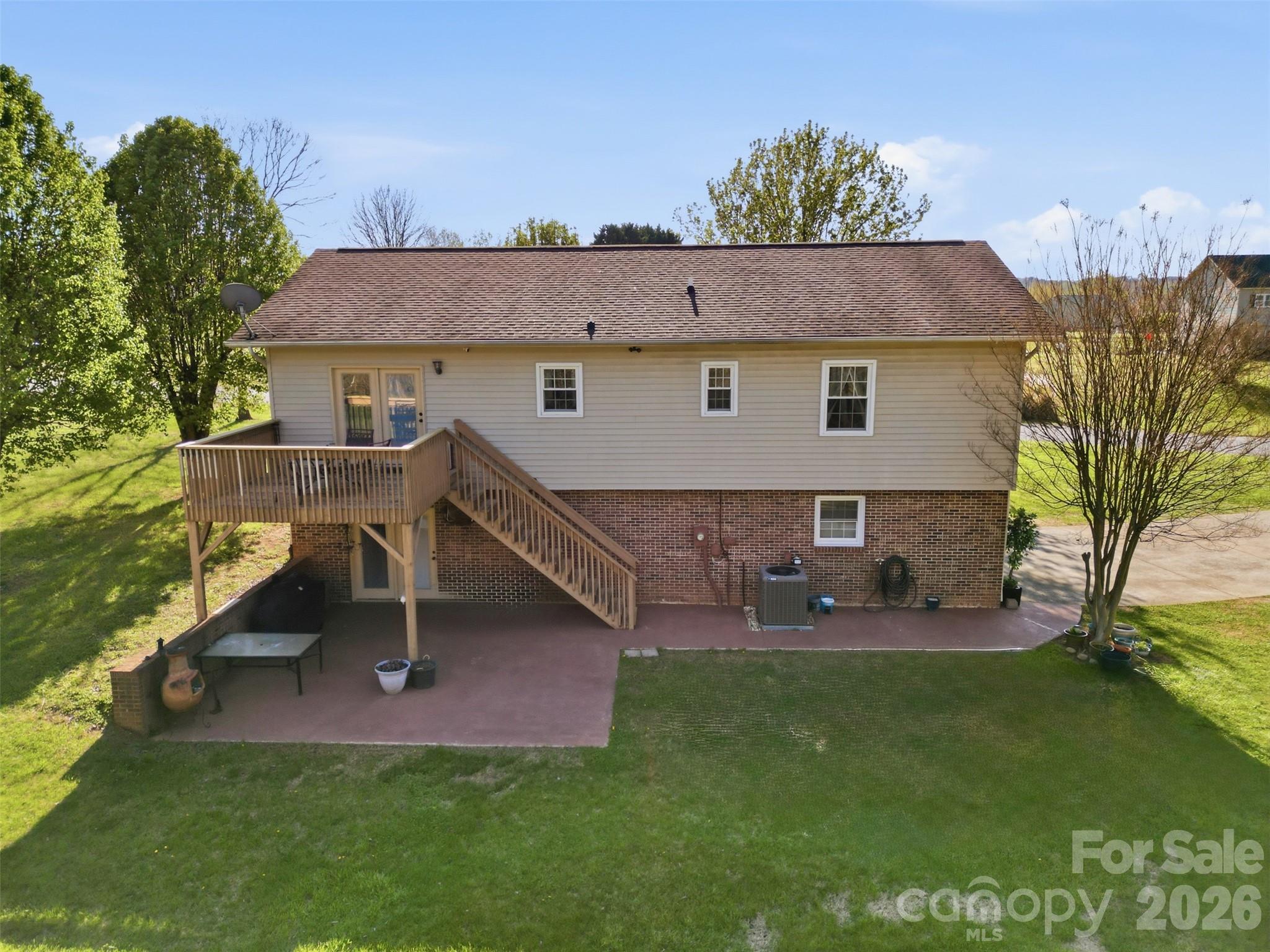 3918 Plum Street Conover, NC 28613 - Photo 27 of 31 an aerial view of a house with a garden and a bench