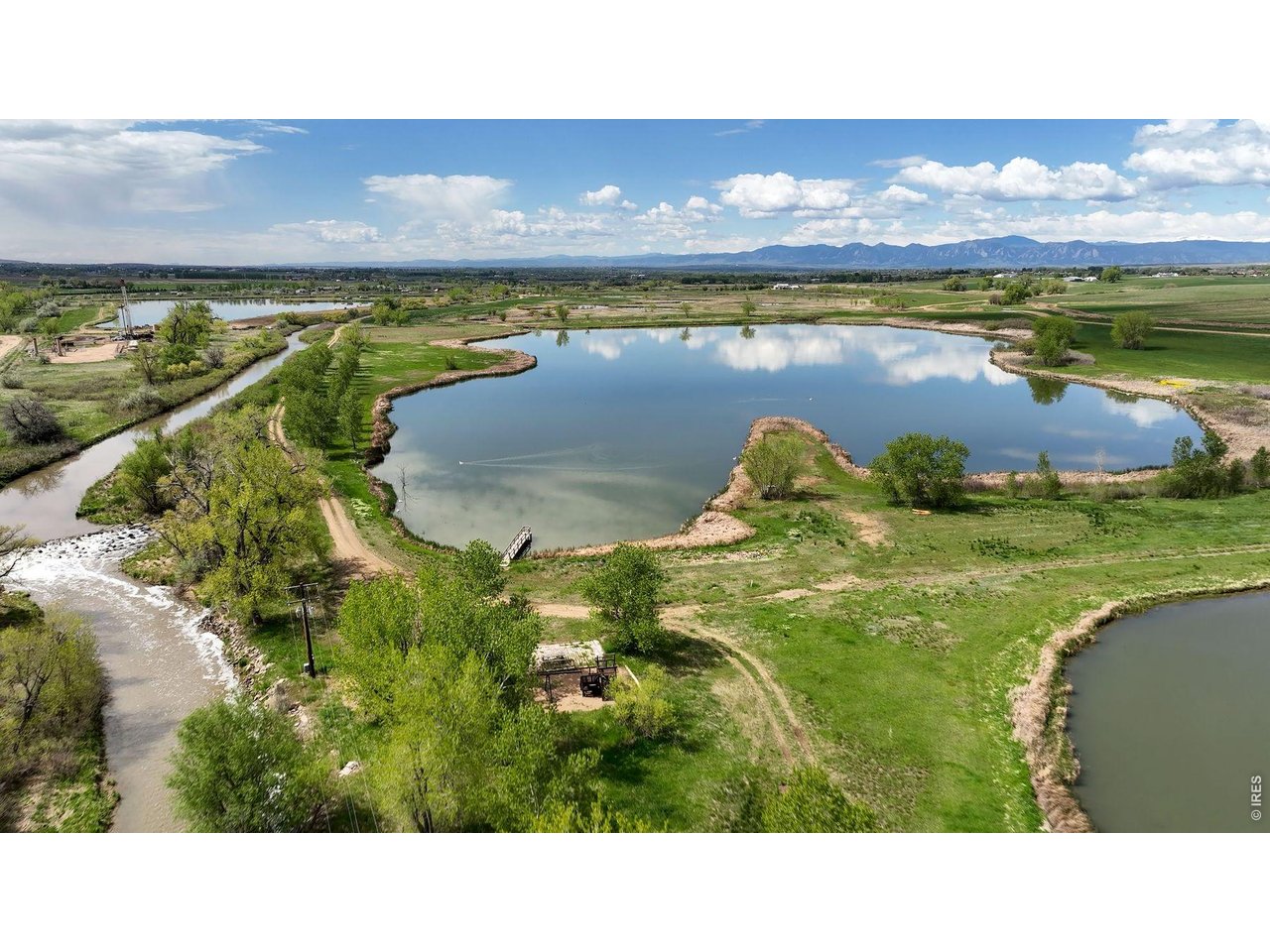 8190 Nelson Lakes Drive Frederick, CO 80504 - Photo 3 of 10 a black and white photo of a lake