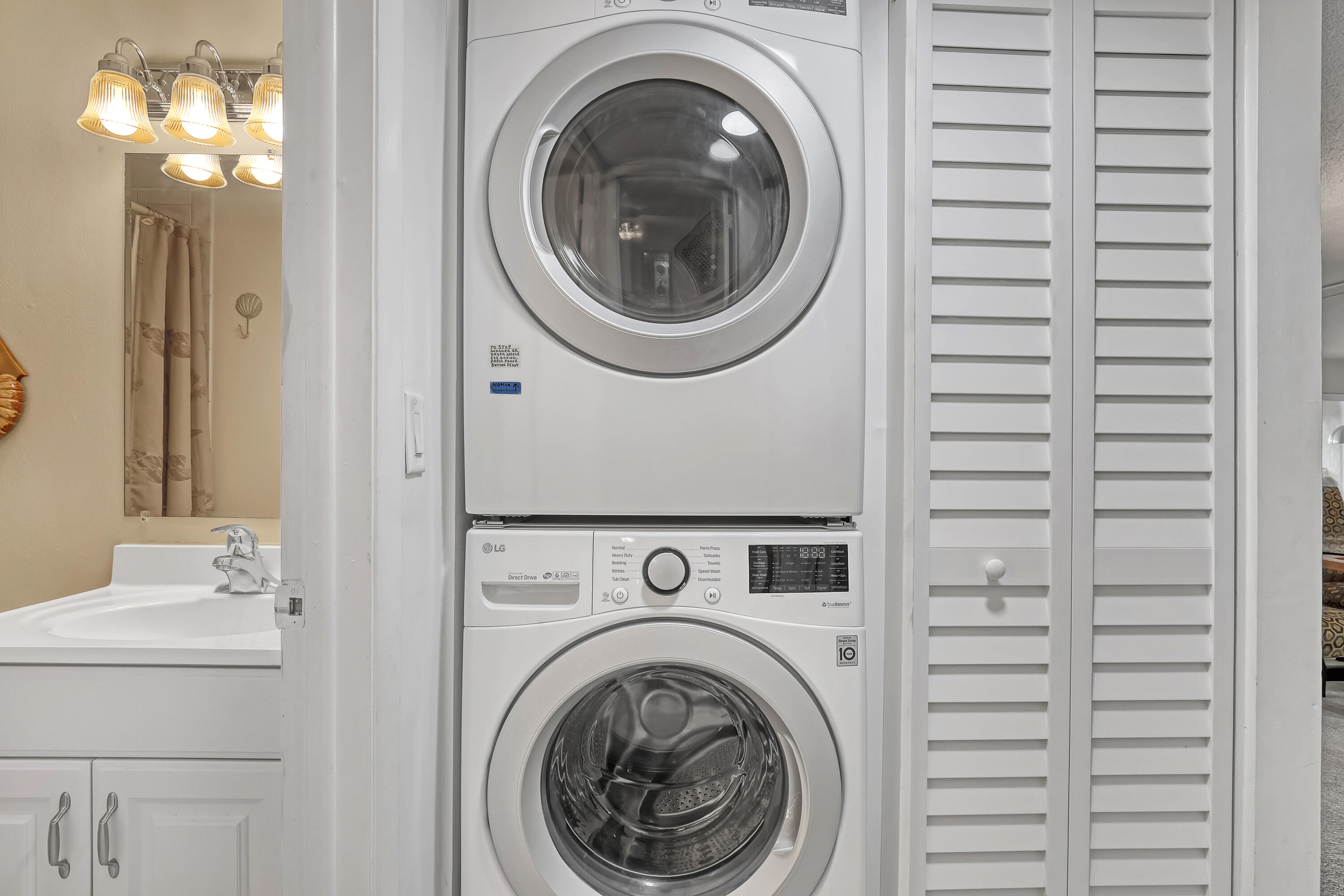 1100 Surf Road, Unit 215 Singer Island, FL 33404 - Photo 17 of 30 Private Washer/Dryer
