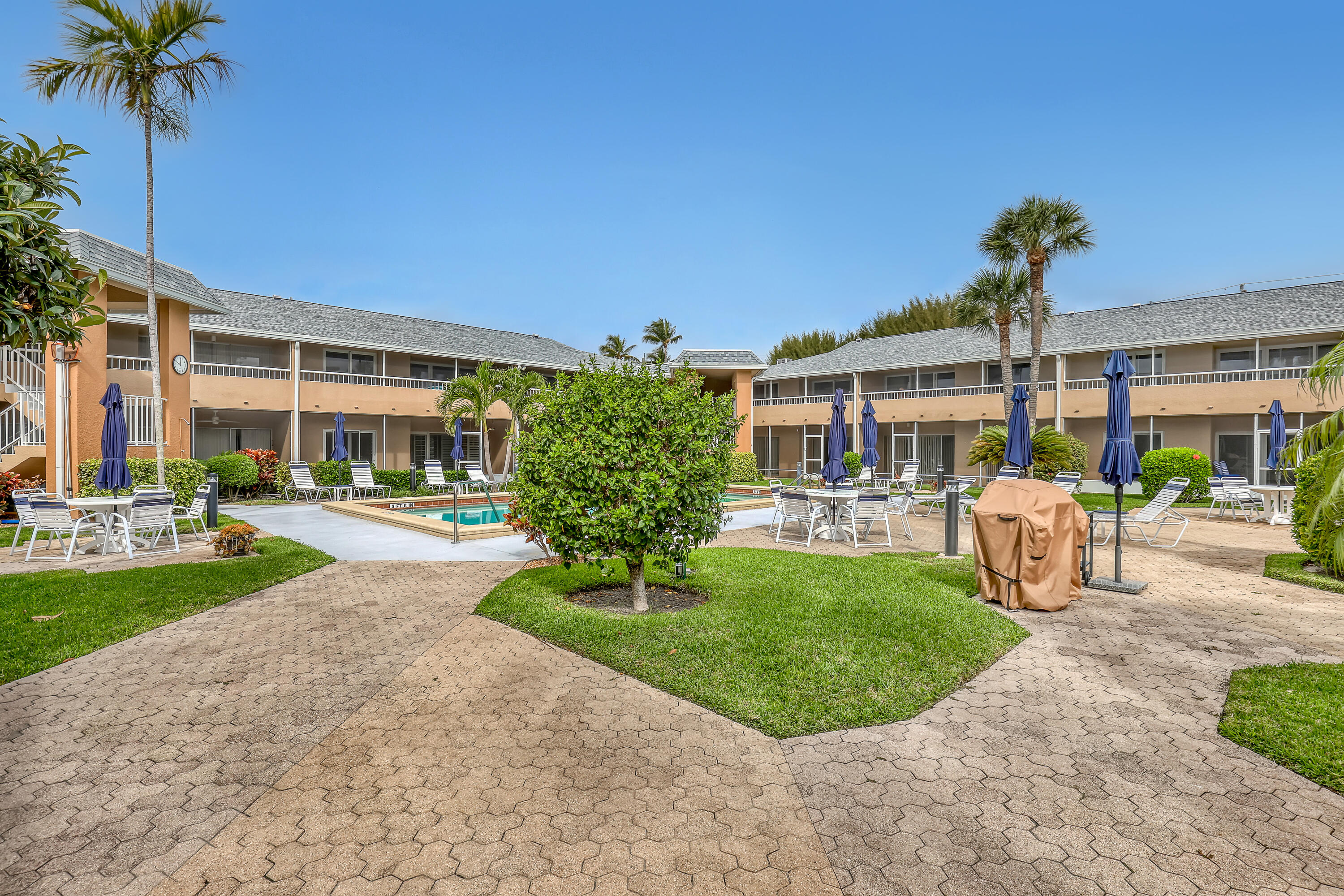 1100 Surf Road, Unit 215 Singer Island, FL 33404 - Photo 24 of 30 pool area/BBQ