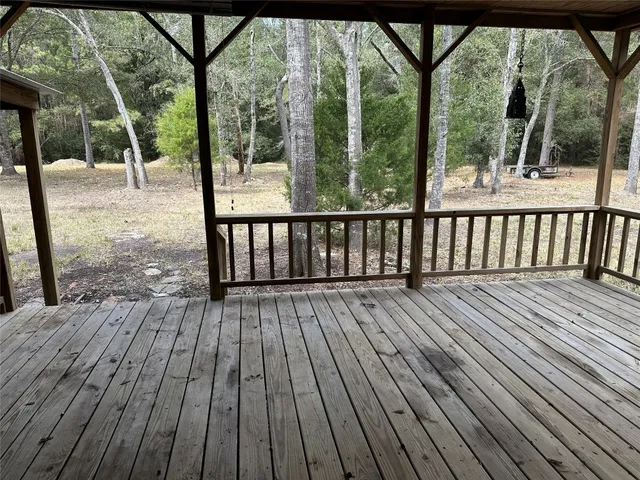 a view of backyard with green space