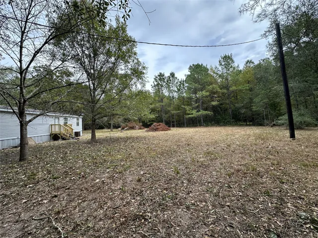 a view of balcony with deck and outdoor space