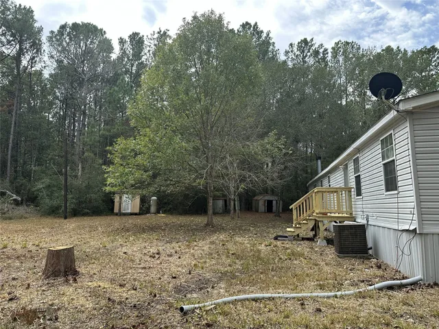 a house with trees in front of it