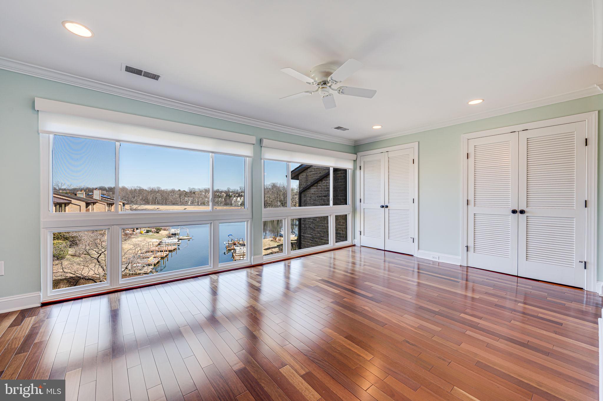 11222 Lagoon Lane Reston, VA 20191 - Photo 1 of 20 a view of an empty room with wooden floor