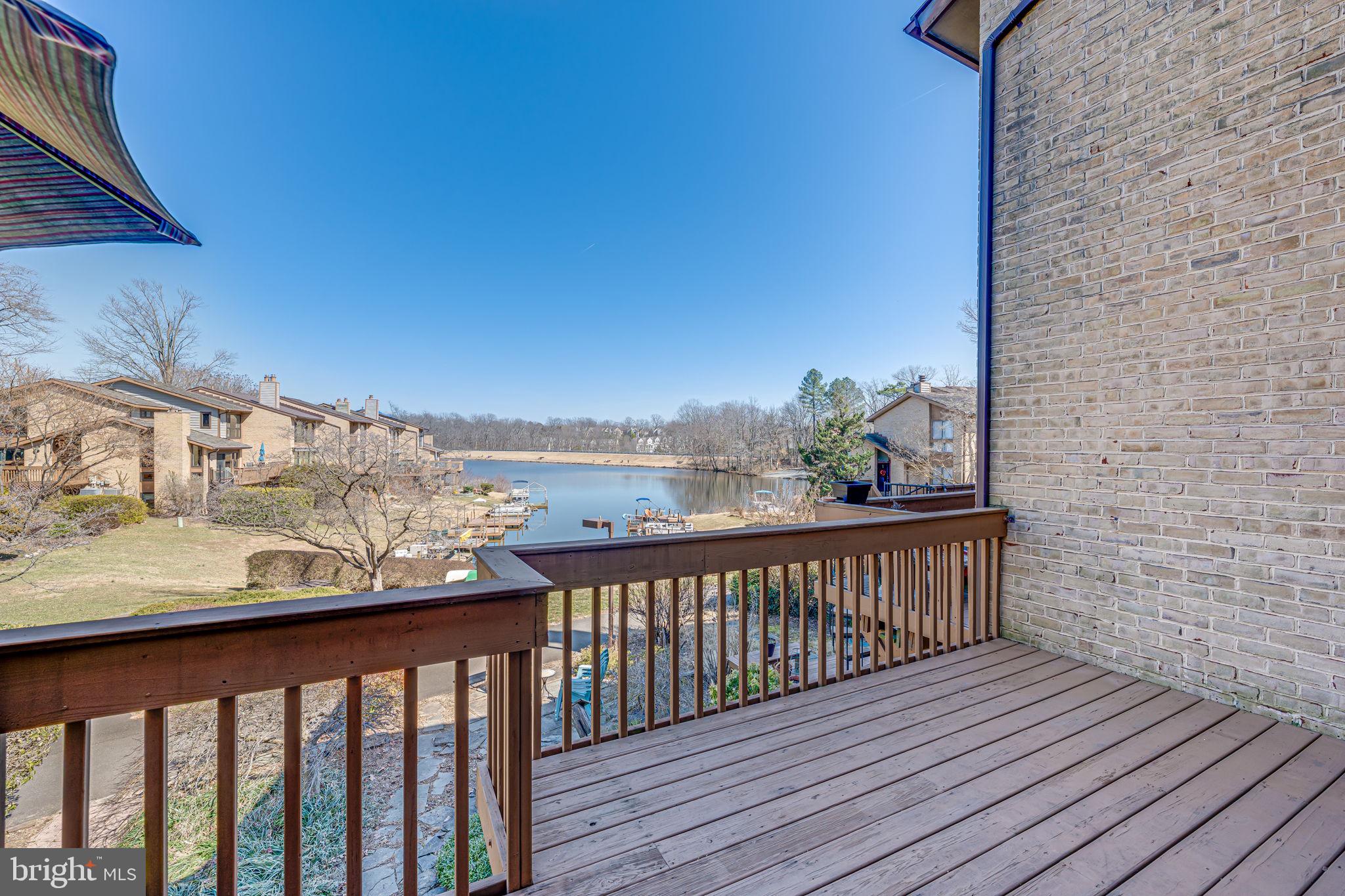 11222 Lagoon Lane Reston, VA 20191 - Photo 6 of 20 a view of balcony with wooden floor