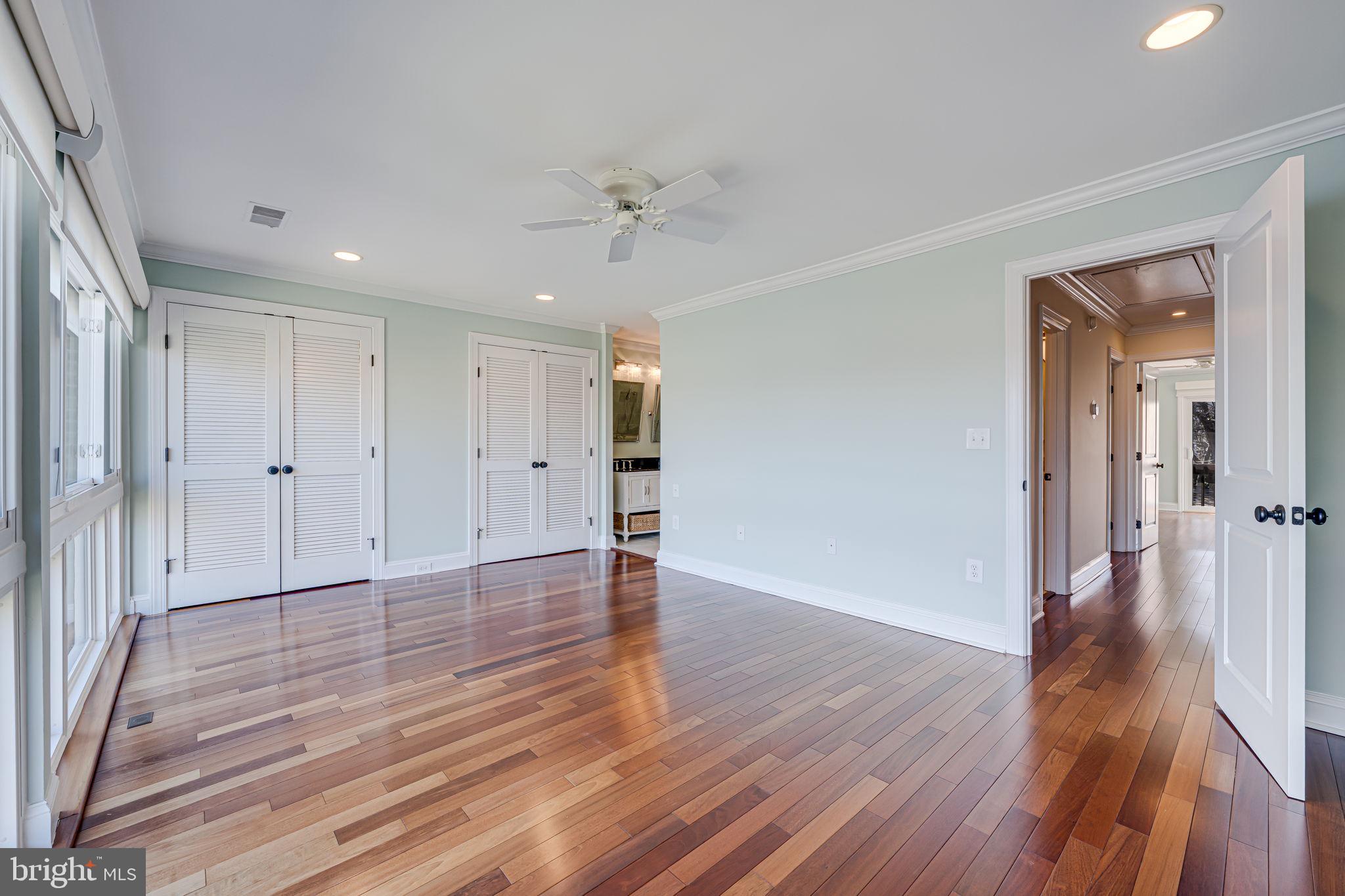 11222 Lagoon Lane Reston, VA 20191 - Photo 10 of 20 wooden floor in an empty room with a window