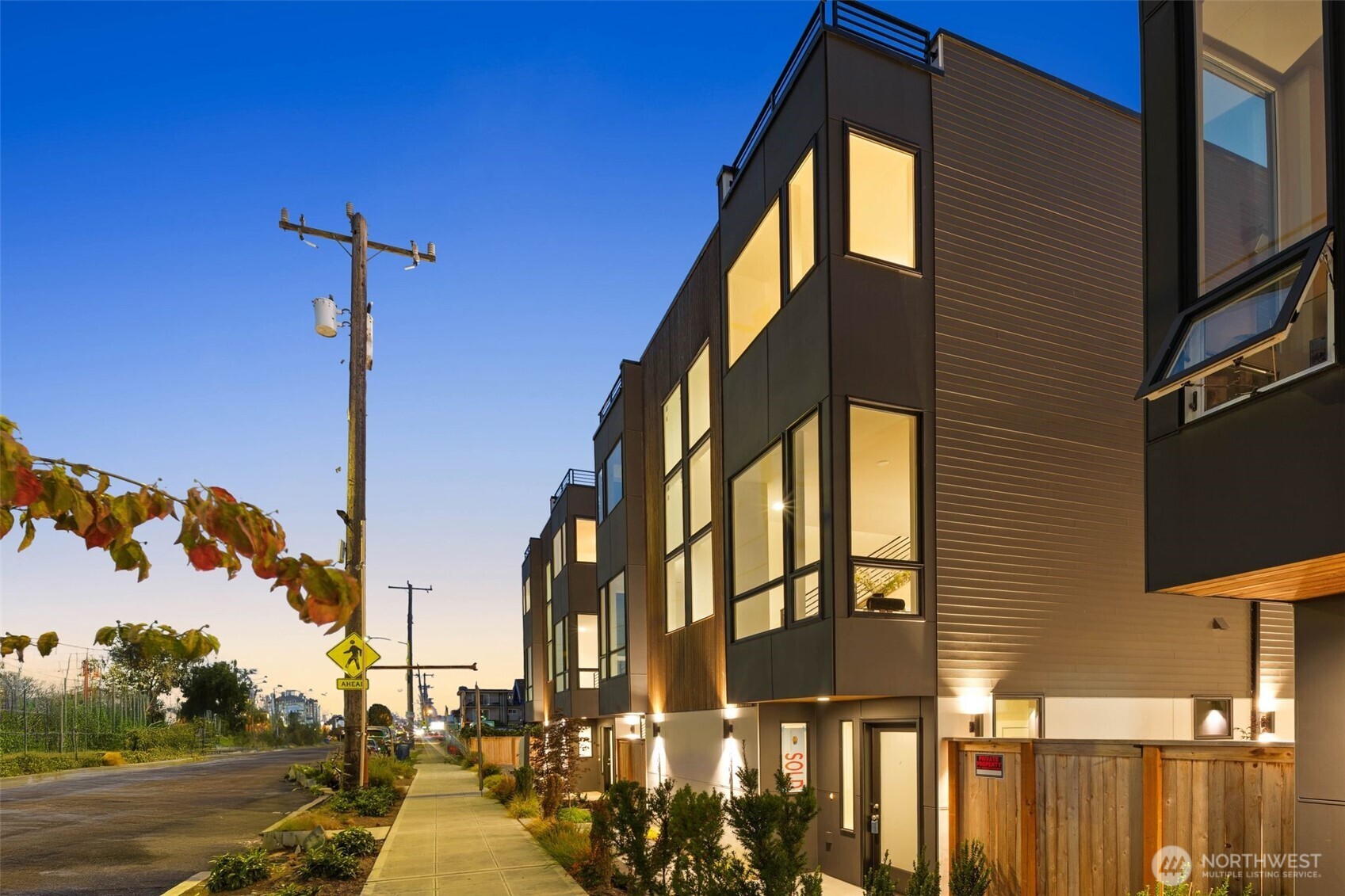 a city street lined with tall buildings