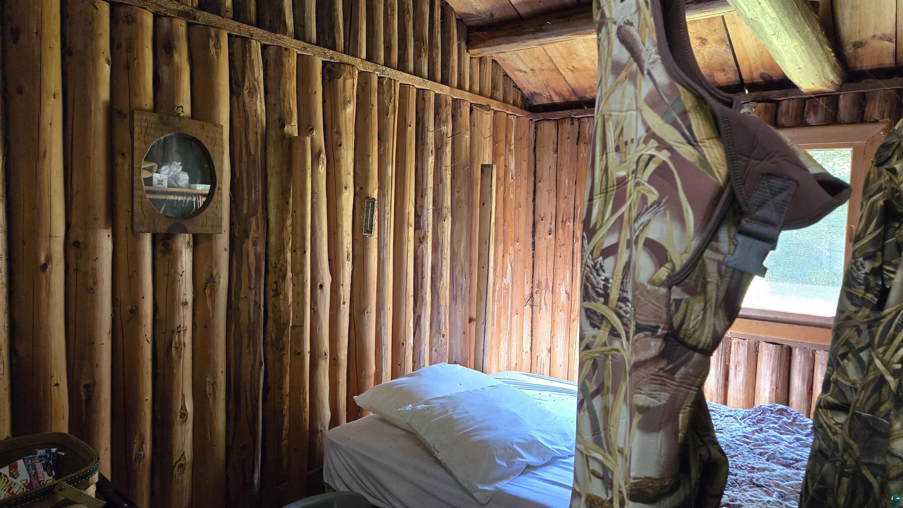 Tbd33 Tbd33 Donovan Point Orr, MN 55771 - Photo 25 of 50 Misc room featuring wooden walls and a vaulted wooden ceiling